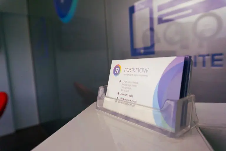 Stack of Resknow business cards displayed in the Sidcup office reception area