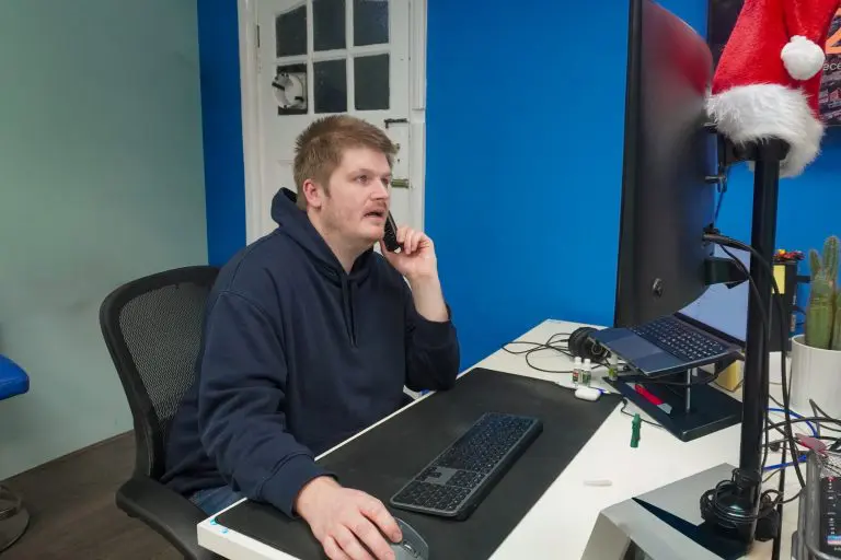 Digital agency team member discussing website access and support with a client